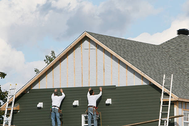 Professional Siding Installation technician working in Bailey, NC